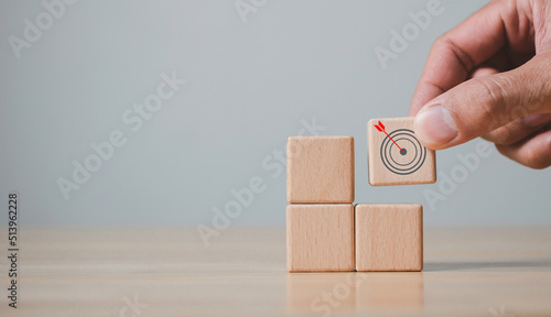 Hand holds wood cubes with person data, Customer psychology profile or characteristics, Buyer personal and target customer concept.