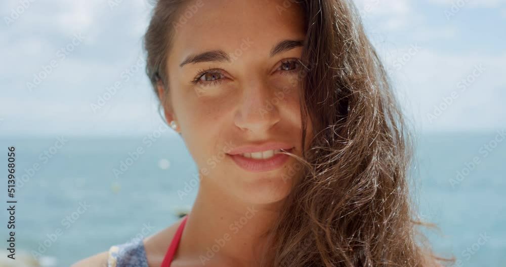 Portrait beautiful woman smiling on beach during summer vacation Portrait beautiful woman smiling on beach during summer vacation