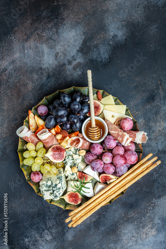 French cheese collection camembert, emmental, marble delicous cheese, blue cheese french, dorblu, mold, roquefort, cheese platter, snacks. place for text, top view