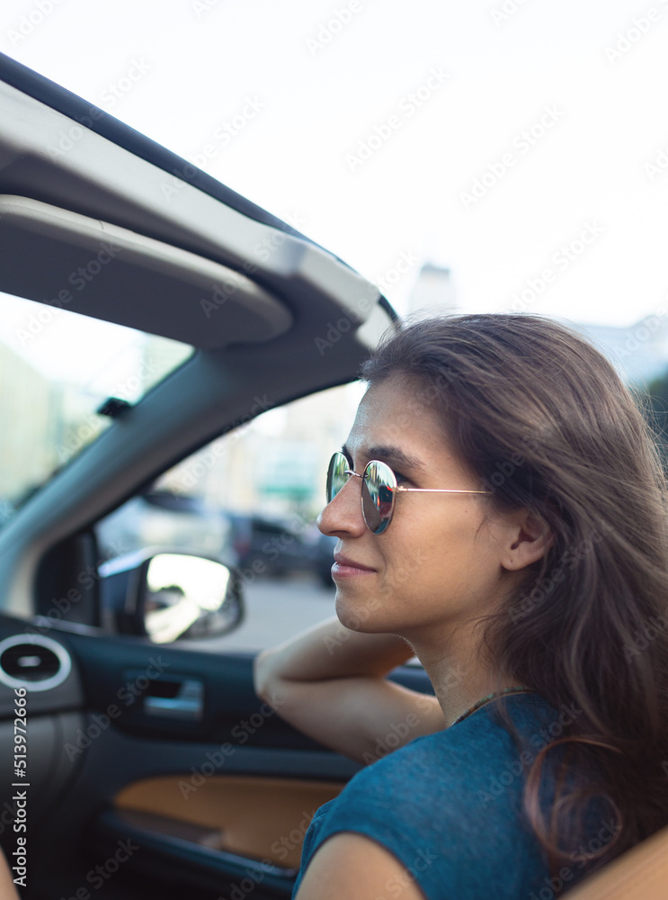 portrait of a girl in a car