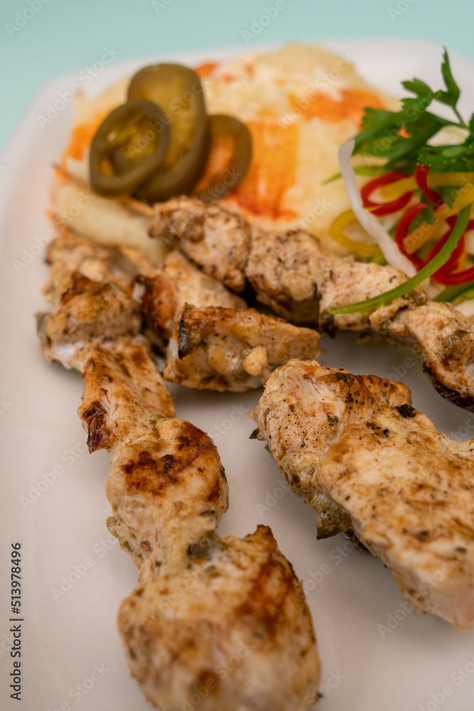 Chicken kebab with bell pepper and rice