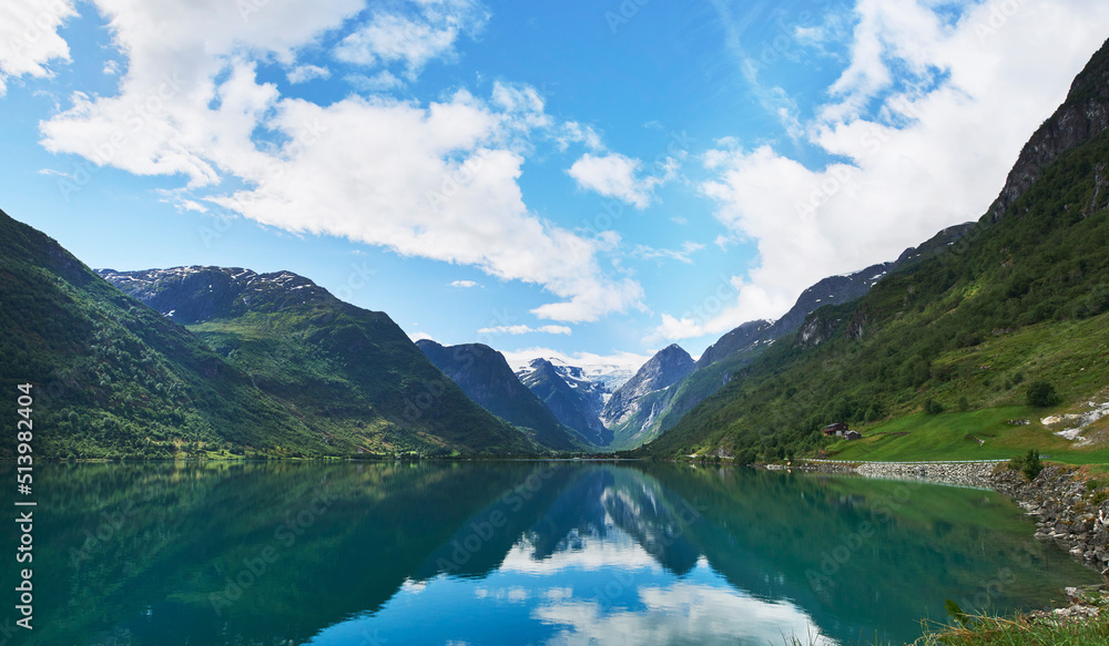Majestic beautiful fjord landscape in Norway Fjord lake mountain snow water reflection glacial valley
