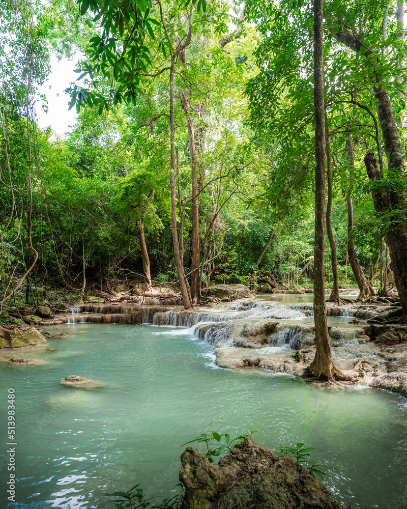Naklejka premium beautiful emerald waterfalls green forest mountains guiding for backpacker Thailand destinations backpacking camping relaxing hiking at Erawan waterfall national park, Sinakharin Dam, Kanchanaburi.