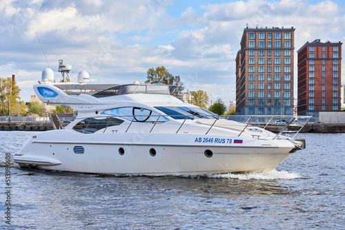 Luxury private motor yacht sailing in the river © Дмитрий Модестов