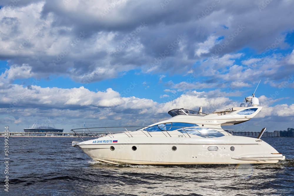 Luxury private motor yacht sailing in the bay