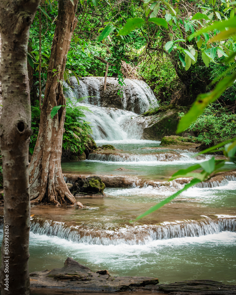 Obraz premium beautiful emerald waterfalls green forest mountains guiding for backpacker Thailand destinations backpacking camping relaxing hiking at Huai Mae Khamin waterfall national park, Kanchanaburi.