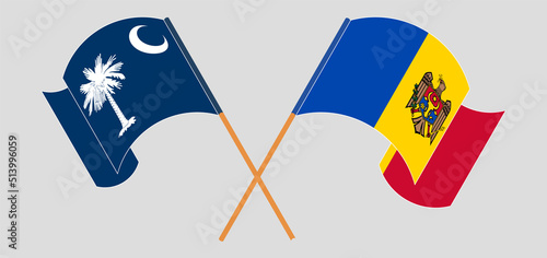 Crossed and waving flags of The State of South Carolina and Moldova