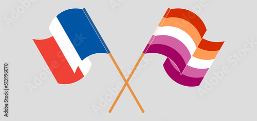 Crossed and waving flags of France and Lesbian Pride