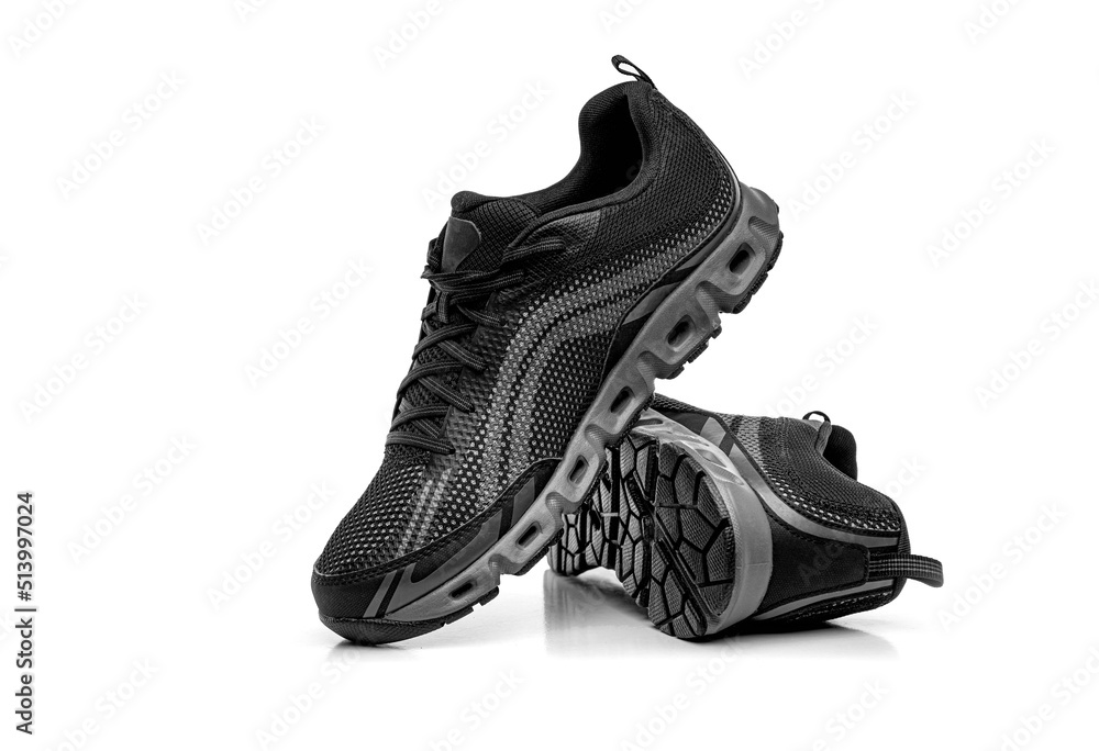 Sport shoes isolated on white background. Black sneakers running shoes.