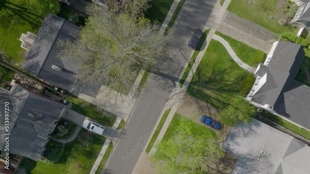 Straight down overhead view of houses in nice neighborhood in St. Louis, Missouri on a pretty spring day. Straight down overhead view of houses in nice neighborhood in St. Louis, Missouri on a pretty spring day.
