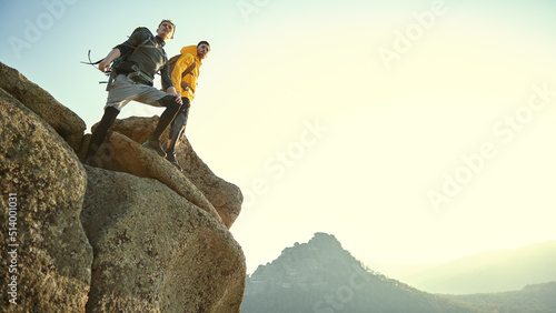 Foto climbers on mountaintop