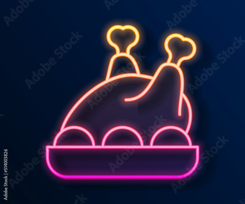 Glowing neon line Roasted turkey or chicken icon isolated on black background. Merry Christmas and Happy New Year. Vector