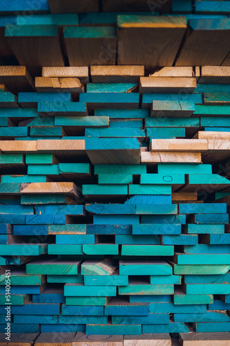 stack of wood with blue paint