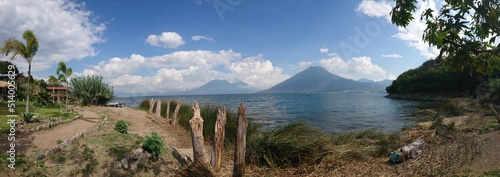 View on Lake Atitlán in Guatemala with volcanos in the background on a sunny day