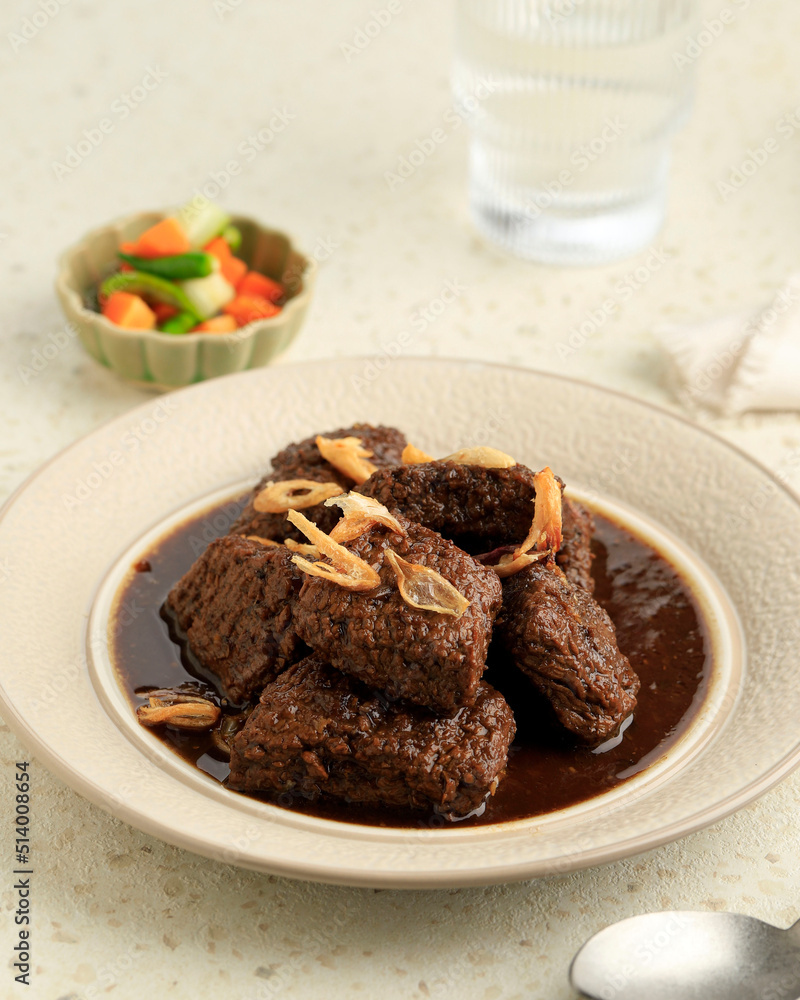 Daging Kelem, Traditional Food from Seamrang, Central Java, Indonesia. Made from Sliced Beef, Coconut Milk, and Spices. Daging Kelem, Traditional Food from Seamrang, Central Java, Indonesia. Made from Sliced Beef, Coconut Milk, and Spices.