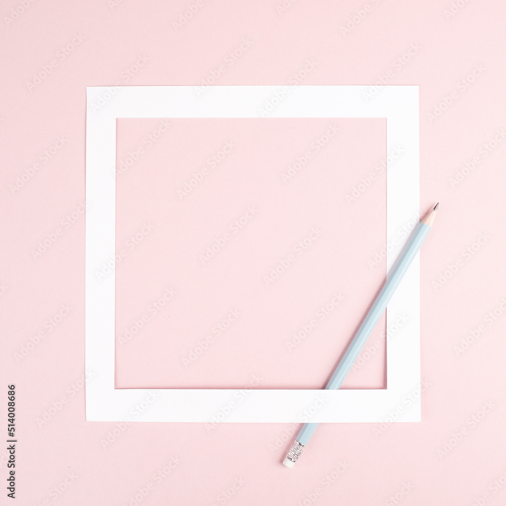 Pencil on a pink paper background, white frame with copy space for text, minimalism, creative and business concept, pastel colored Pencil on a pink paper background, white frame with copy space for text, minimalism, creative and business concept, pastel colored
