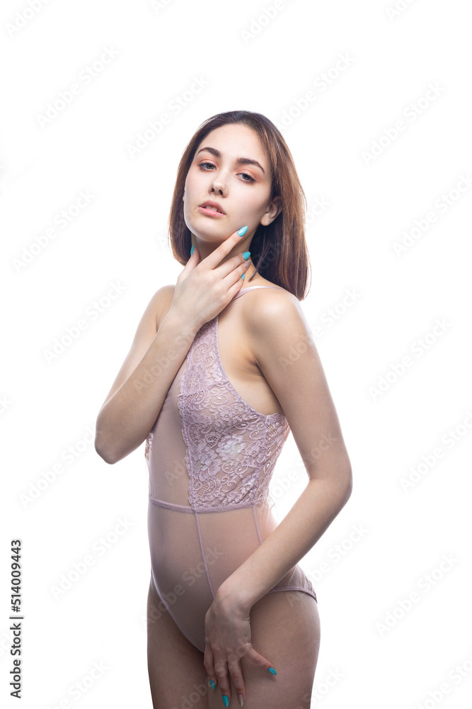 Beautiful sexy lady in elegant nude bodysuit. Fashion beauty portrait of fashion model girl. Beautiful sexy lady in elegant nude bodysuit. Fashion beauty portrait of fashion model girl.