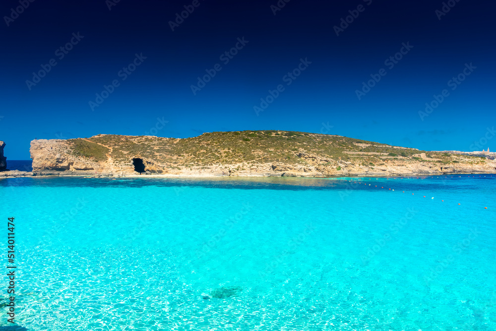 Fototapeta premium Amazing crystal clear water in the Blue Lagoon of Comino Island, Malta