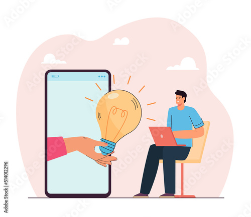 Hand coming out of big phone giving lightbulb to man with laptop. Person getting idea from friend or internet flat vector illustration. Creativity, inspiration, start-up, communication concept