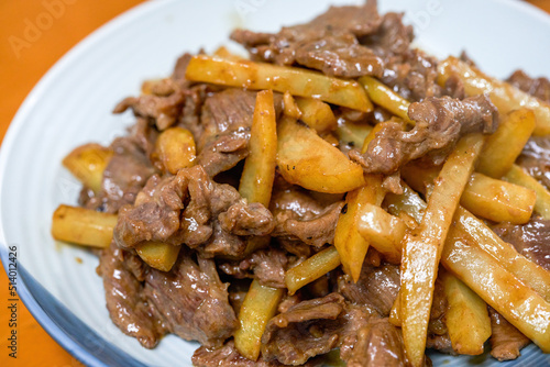 A delicious home-cooked dish, fried beef with potatoes