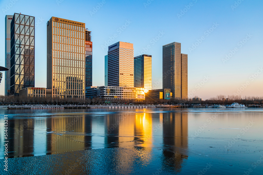 Naklejka premium Riverside towers in the evening