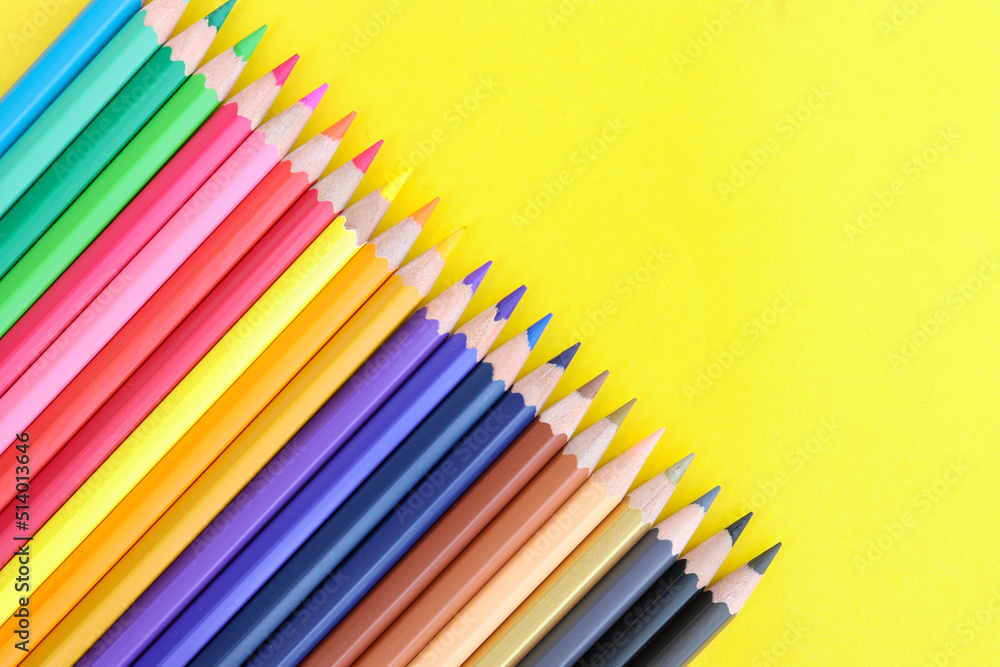 colored pencils with copy space on yellow background educational concept colored pencils with copy space on yellow background educational concept