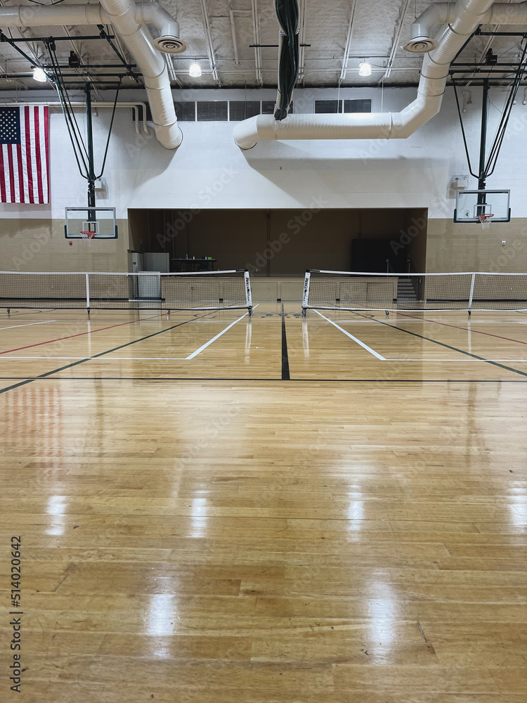Naklejka premium indoor pickleball court gym recreation room