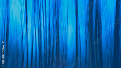 Abstract background blur in shades of blue through intentional camera movement