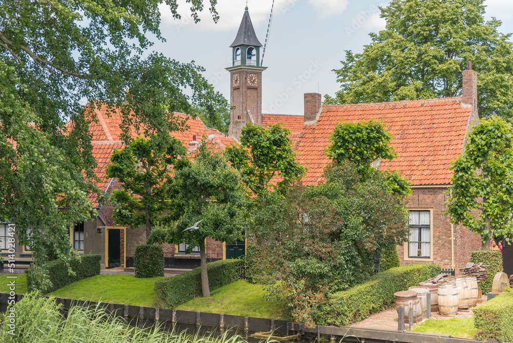 Enkhuizen, Netherlands. June 2022. The church and drawbridge of the Zuiderzee Museum in Enkhuizen.