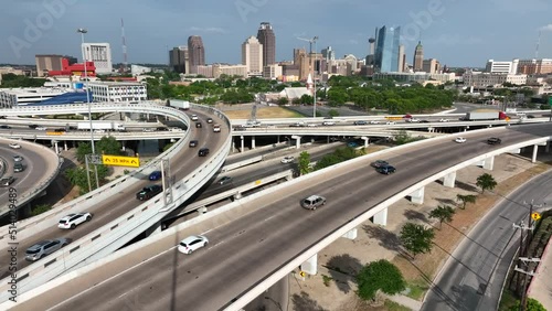San Antonio Texas skyline. Aerial of freeway highway at golden hour.