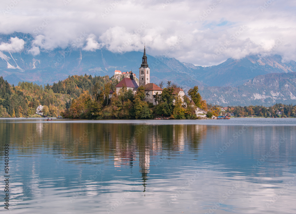 Lake Bled with the church on the island and castle on the hill in autumn time.