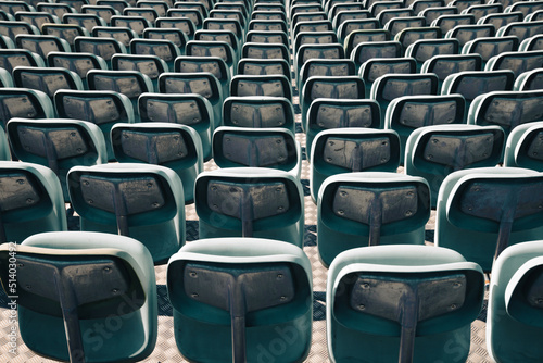 Empty Plastic Chairs at the Stadium