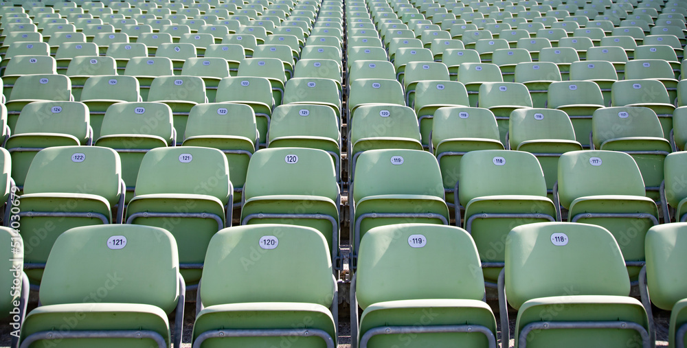 Fototapeta premium Empty Plastic Chairs at the Stadium