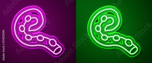 Glowing neon line Octopus of tentacle icon isolated on purple and green background. Vector