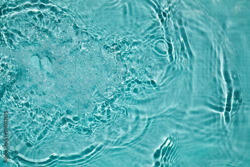 Blue ripped water in swimming pool. Top view