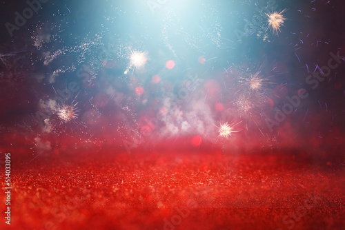 abstract black  red and gold glitter background with fireworks. christmas eve  4th of july holiday concept