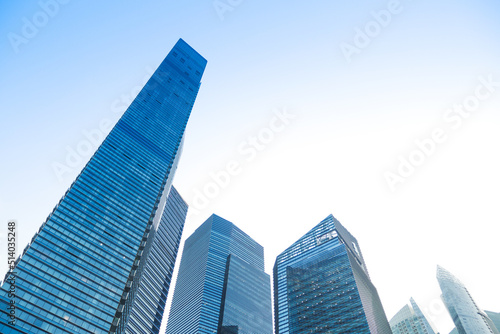  low angle view of singapore modern city buildings.