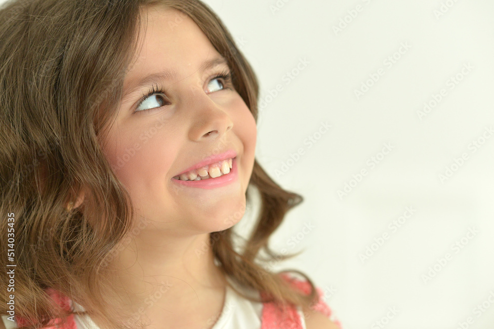 Beautiful happy girl looking at camera indoors Beautiful happy girl looking at camera indoors