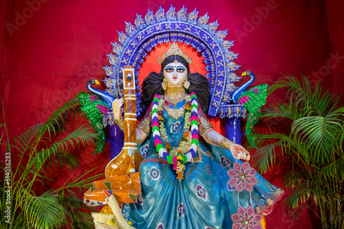 Face of Goddess Saraswati at Kolkata, West Bengal, India. Saraswati is Hindu goddess of knowledge, music, art, wisdom, and learning. Worshipping is done to get divine blessing to achieve excellence. © mitrarudra