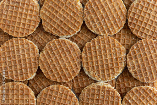 Flat lay of many Dutch syrup waffle cookies ( stroopwafels)