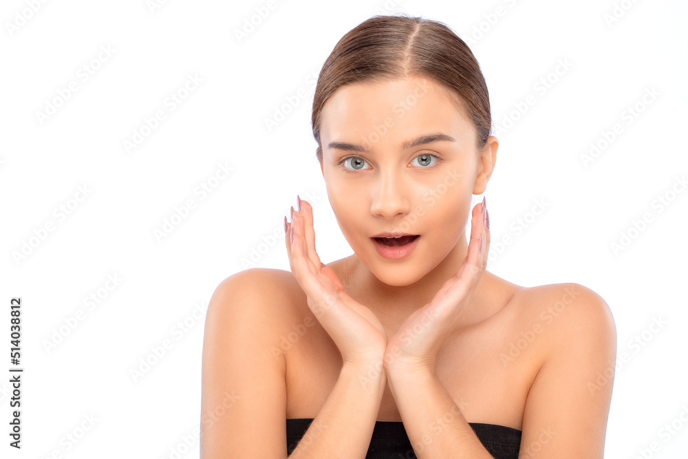 Beautiful young woman with clean skin holds her hands near her face. Makeup and healthy clear skin. Beautiful young woman with clean skin holds her hands near her face. Makeup and healthy clear skin.