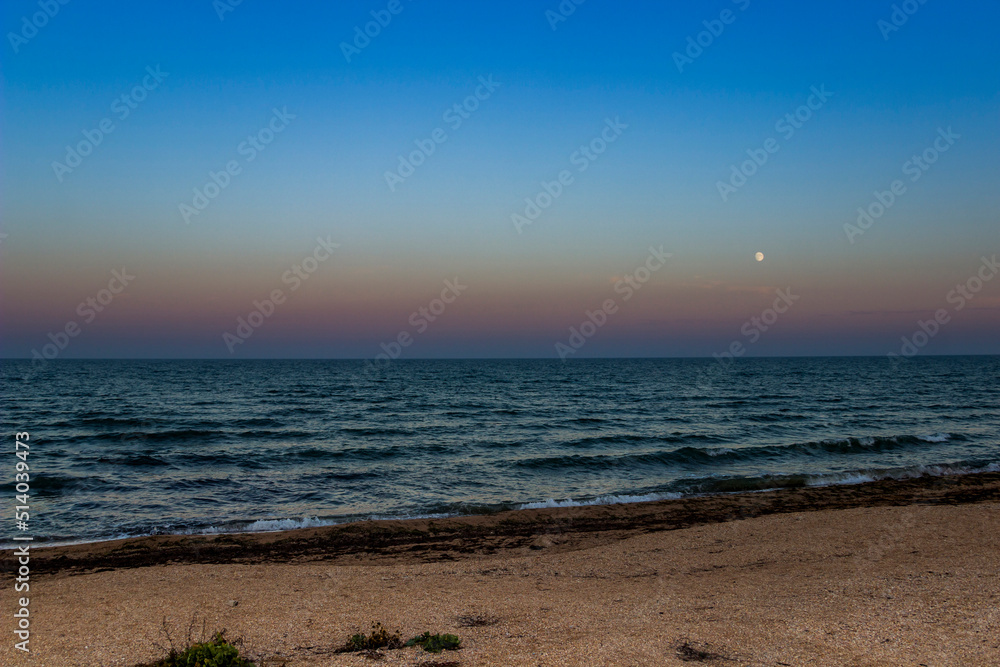 the evening sea landscape at the stormy weather, Azov sea, Ukraine