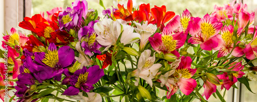 a large bouquet of multi-coloured alstroemerias