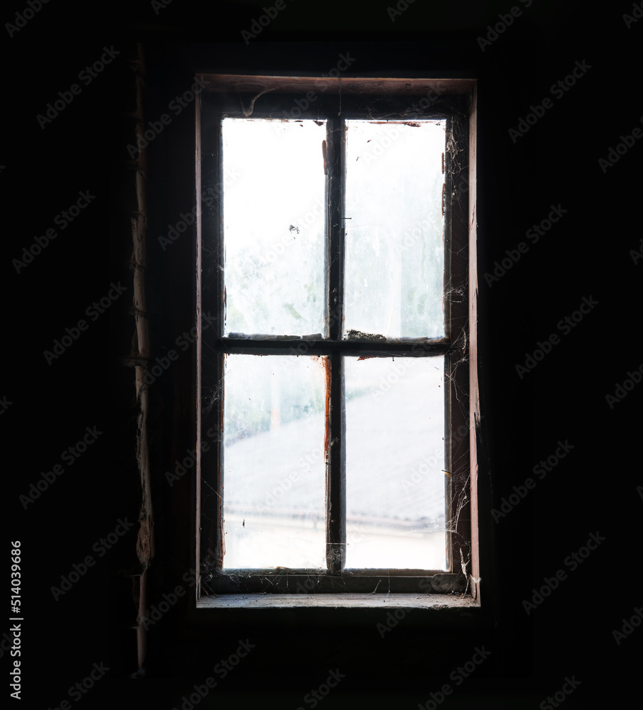 Old window in the attic Old window in the attic