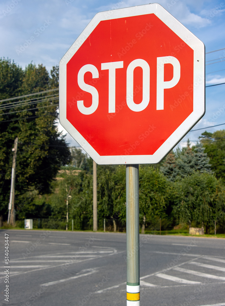 Stop sign in front of an intersection
