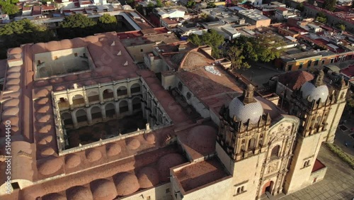 Aerial Shot of Cathedral Templo de Santo Domingo de Guzman is a Baroque ecclesiastical building at sunset in Oaxaca, Mex photo