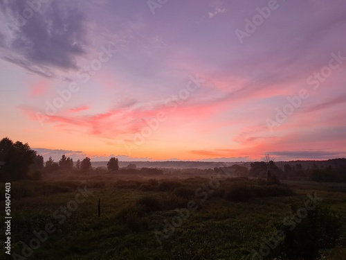 fantastic sunsets over the hills, meadows and forest