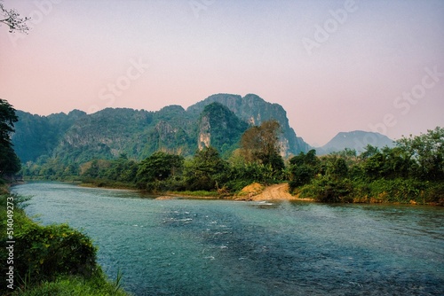 Surreal landscape by the Song river at Vang Vieng, Laos. High quality photo photo