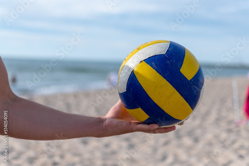 playing volleyball on the beach