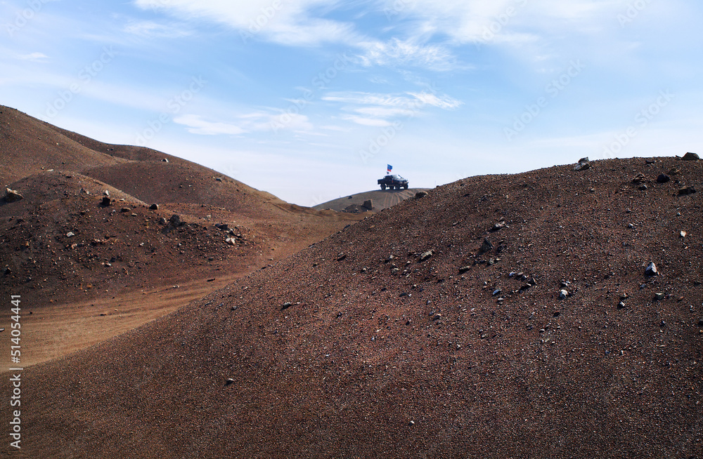 Auto racing trial in desert. Silhouette of an off-road car in on top of dune Auto racing trial in desert. Silhouette of an off-road car in on top of dune